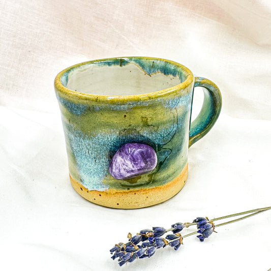 Magic mug with natural amethyst crystal