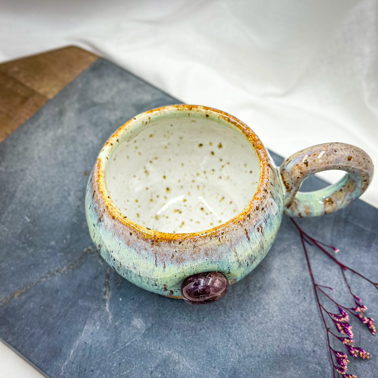 Magic mug with natural Amethyst crystal