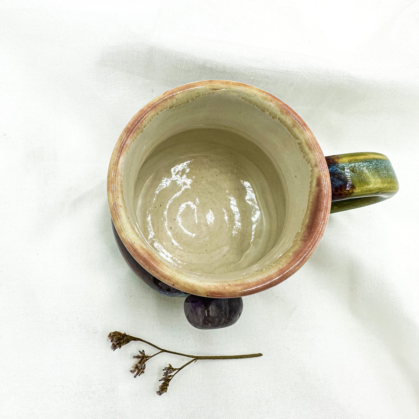 Magic mug with natural amethyst crystal