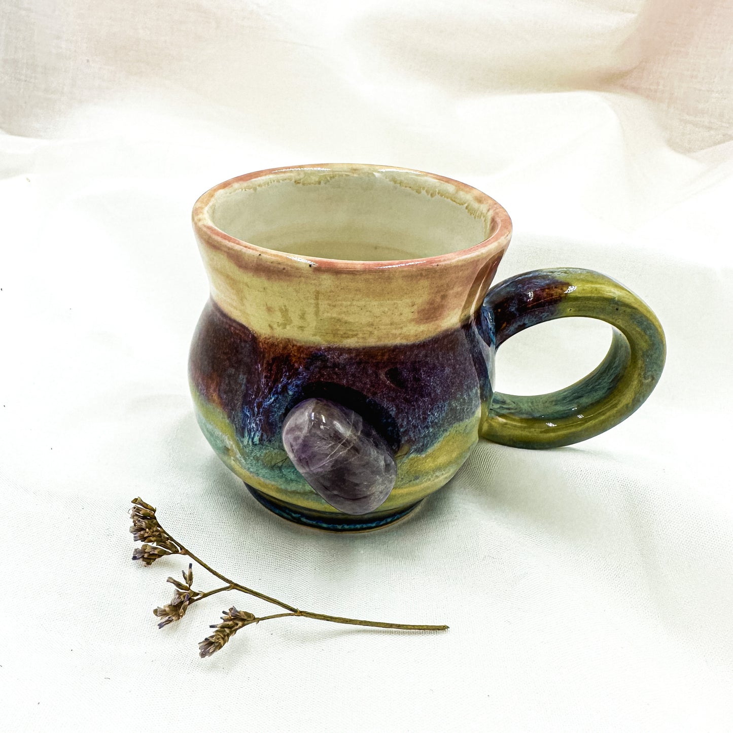 Magic mug with natural amethyst crystal