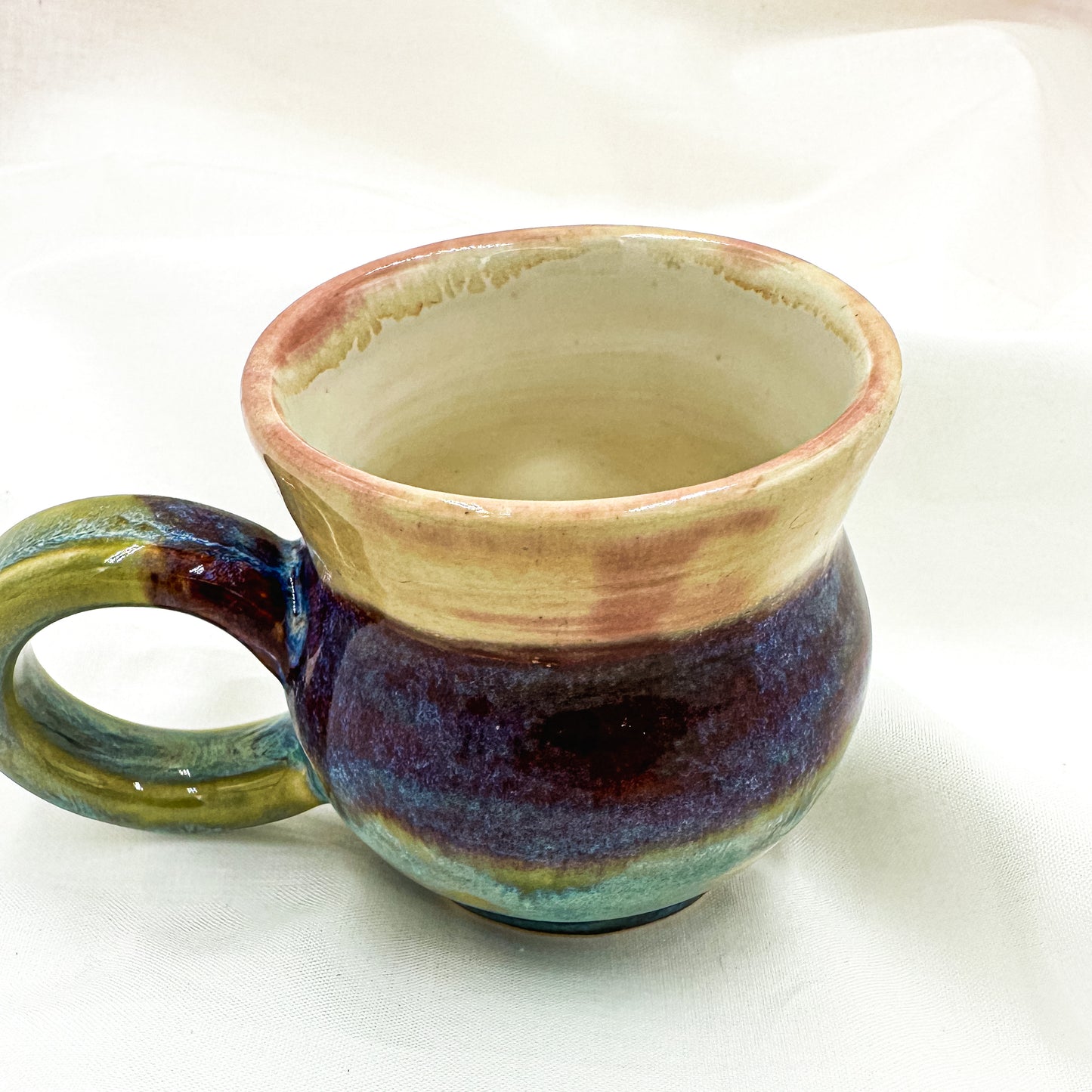 Magic mug with natural amethyst crystal